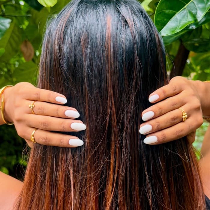 Milky white · almond — nails by Ezra's Nail Studio, Aluva