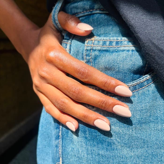 Extensions · soft peach almond — nails by Ezra's Nail Studio, Aluva